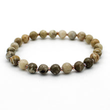 Carica l'immagine nel visualizzatore di Gallery, Bracciale unisex Corallo fossile 6 mm lisci
