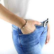 Carica l'immagine nel visualizzatore di Gallery, Bracciale unisex Corallo fossile 6 mm lisci