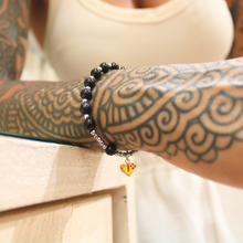 Carica l'immagine nel visualizzatore di Gallery, Bracciale tormalina, ematite e ambra dei balcani
